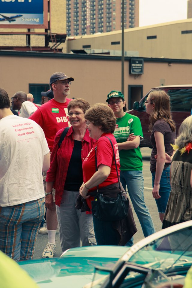 Rep. Tina Liebling and Rep. Alice Hausman talk at the Twin Cities Pride Parade.